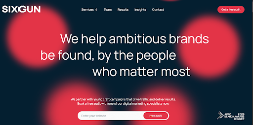 Sixgun homepage with red circles background and headline saying “we help ambitious brands be found by the people who matter most”